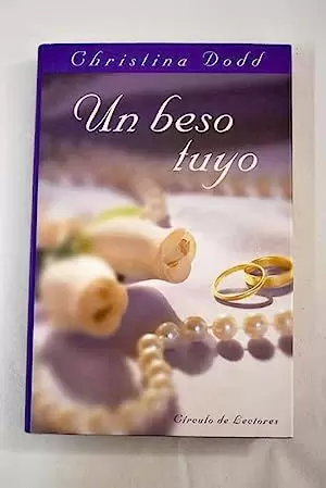 UN BESO TUYO UN BESO TUYO